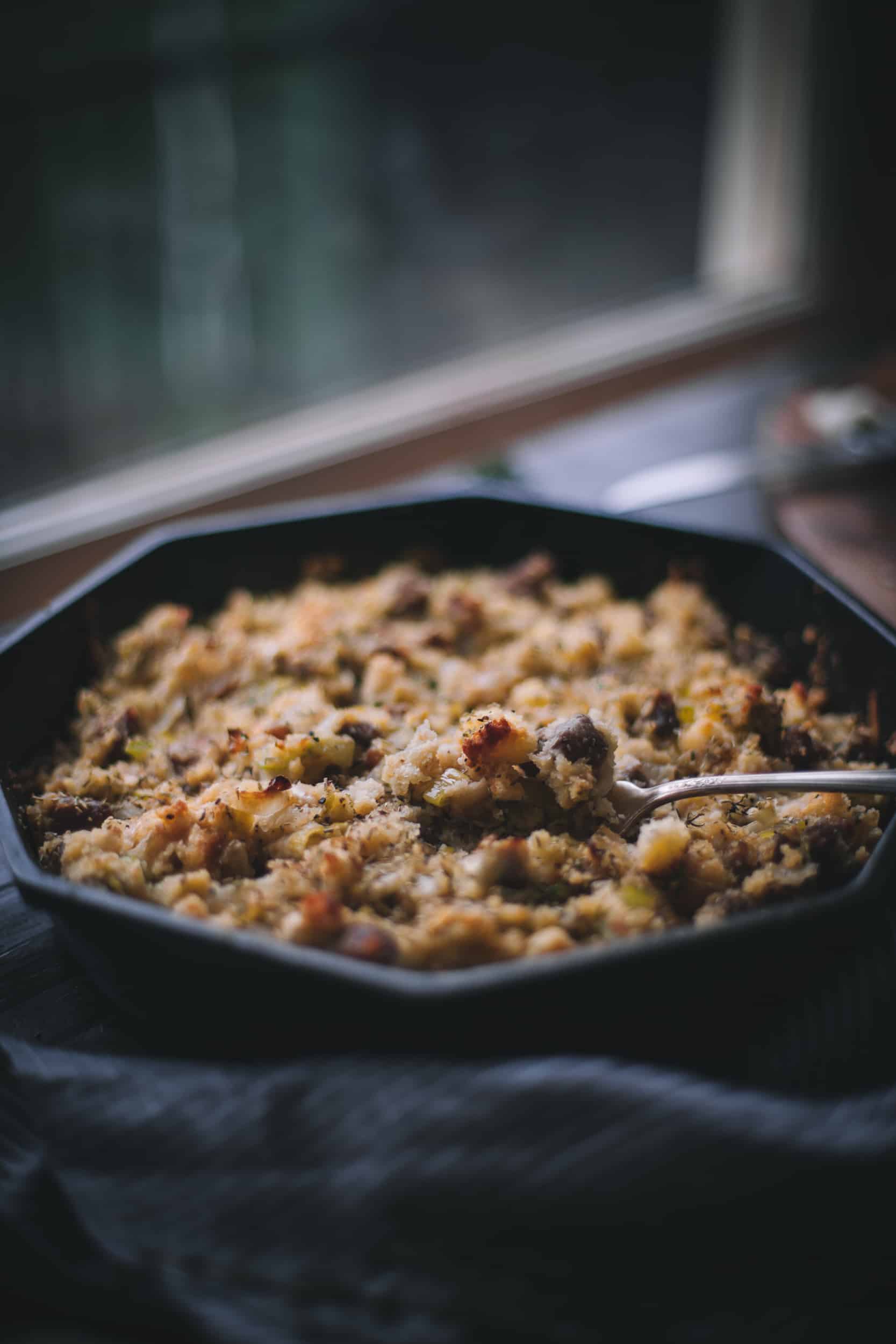 Cast Iron Cornbread Stuffing with Leeks Sausage and Pears by Eva Kosmas Flores