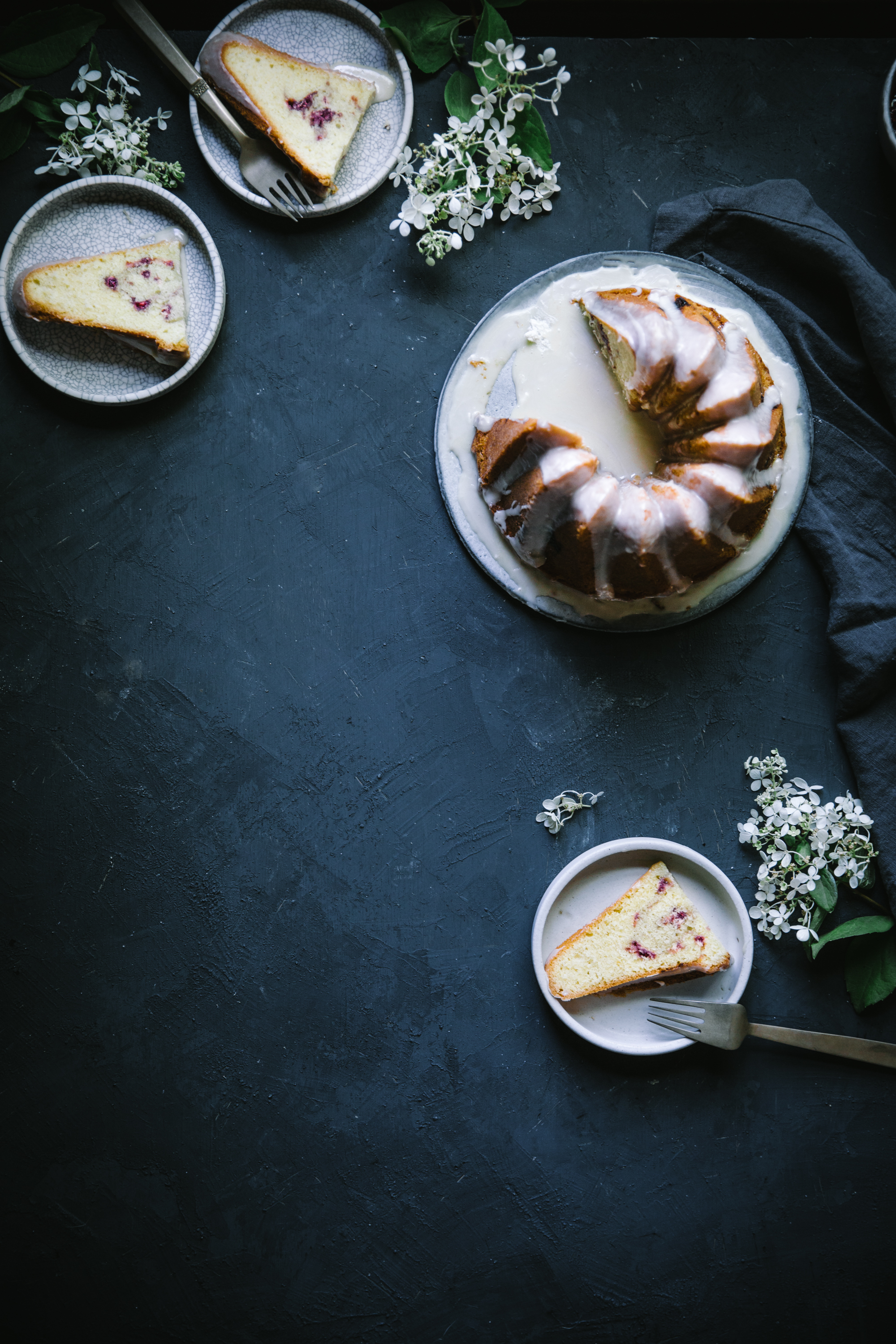 Raspberry Almond Swirl Cake with White Chocolate Glaze & Salted Vanilla Buttercream Cupcakes