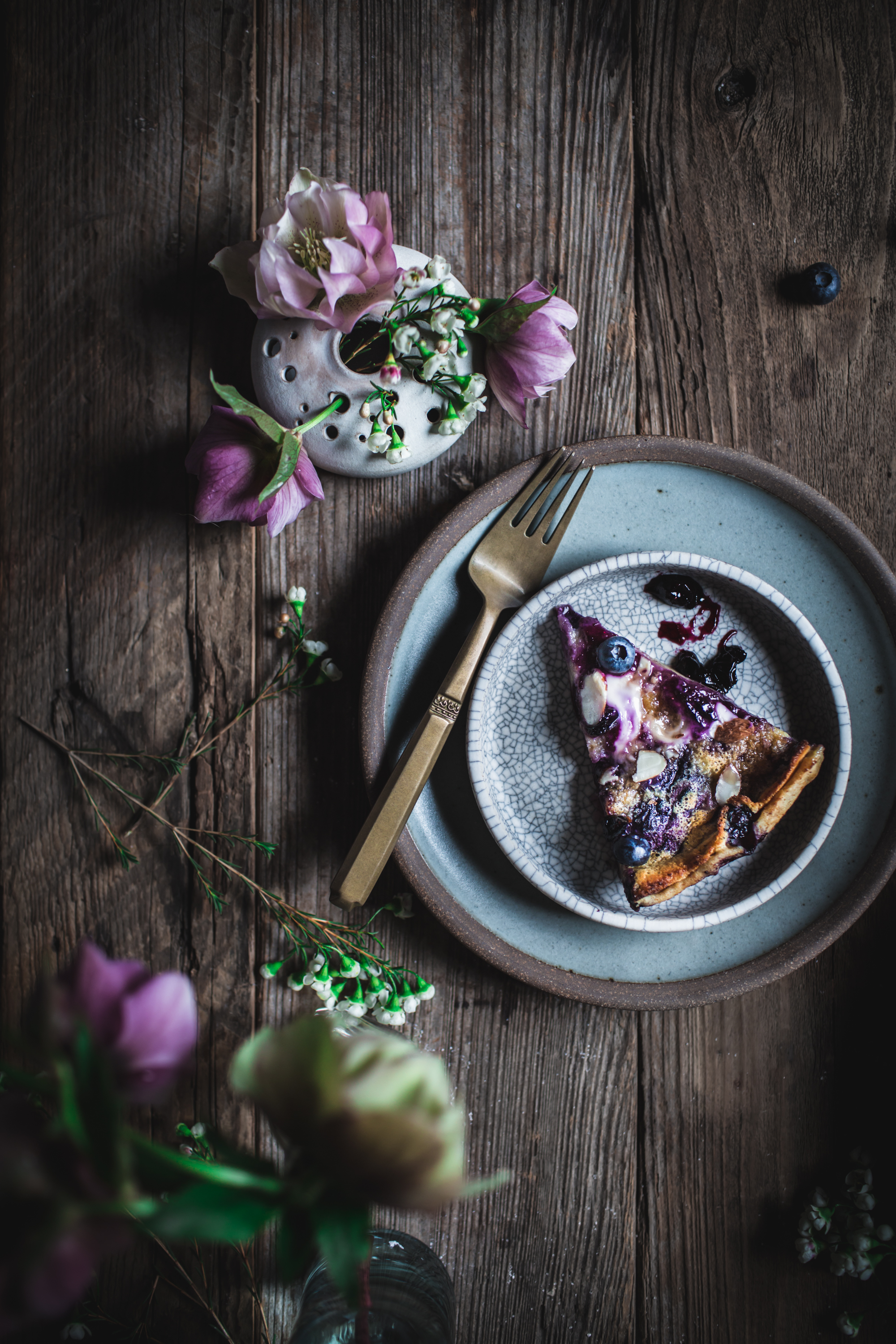 Blueberry Dutch Baby From the Cookbook 'First We Eat' by Eva Kosmas Flores