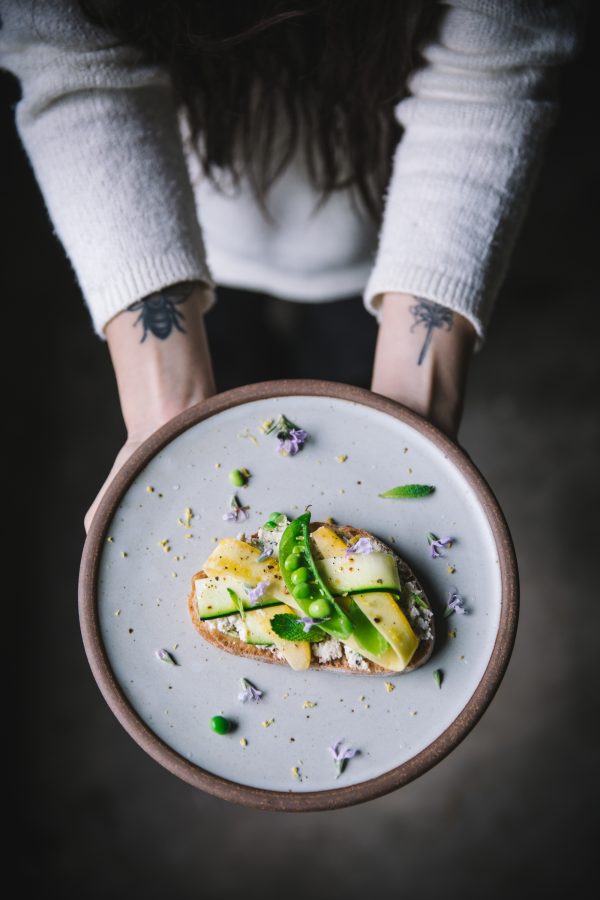 Mint and pea ricotta toasts for an easy healthy spring breakfast from the Wicked Healthy Cookbook