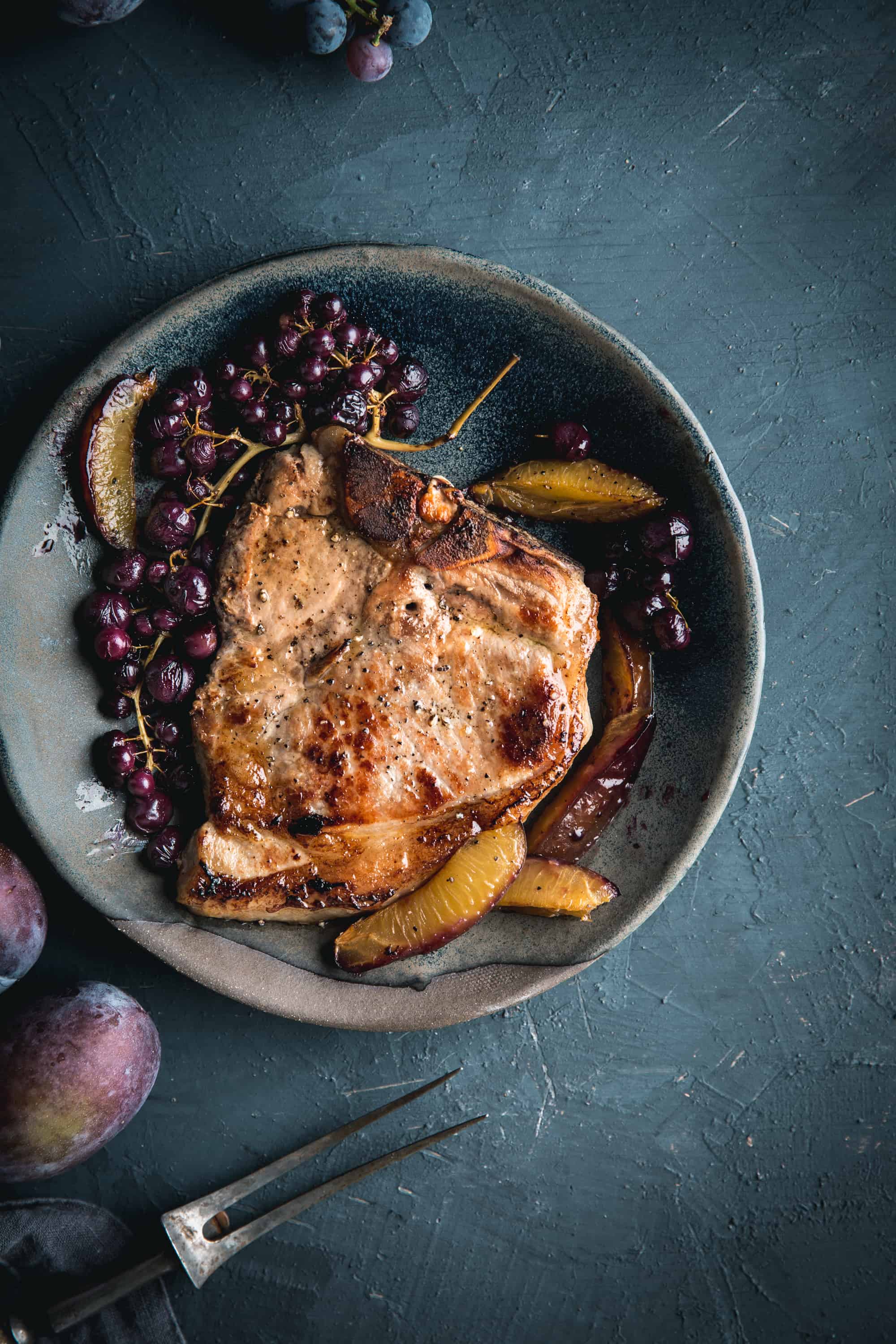 Perfect Brined Bone In Pork Chops with Roasted Grapes and Plums by Eva Kosmas F